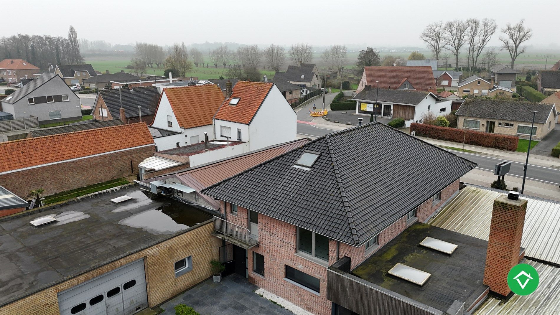 Ruim handelspand met loods en woning te Oudenburg foto 5