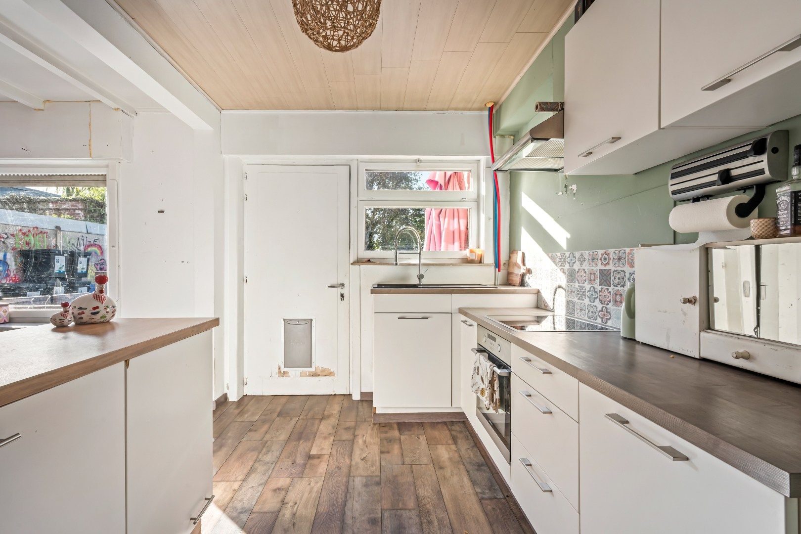 Op te frissen woning met 3 slaapkamers, opslagruimte en tuin op 864m² foto 8