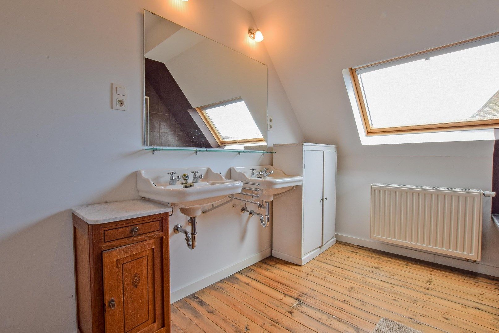 Charmante stadswoning met praktijkruimte in hartje Nieuwpoort-Stad op 91 m². foto 13