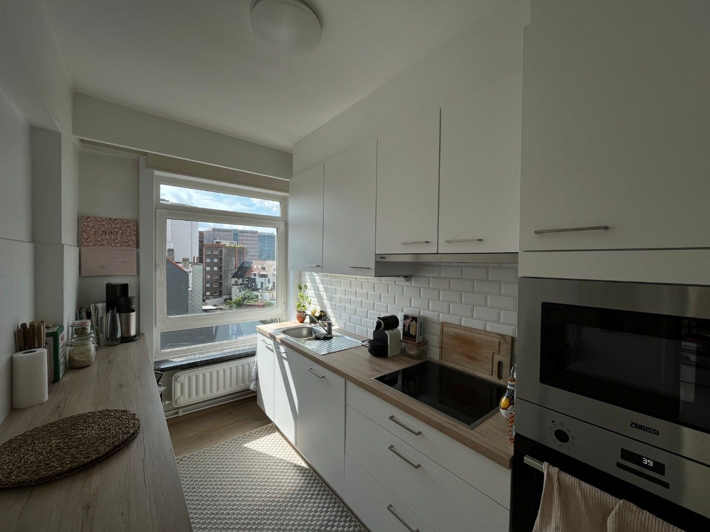 Ruim, lichtrijk appartement met garage én berging (kelder). foto 10