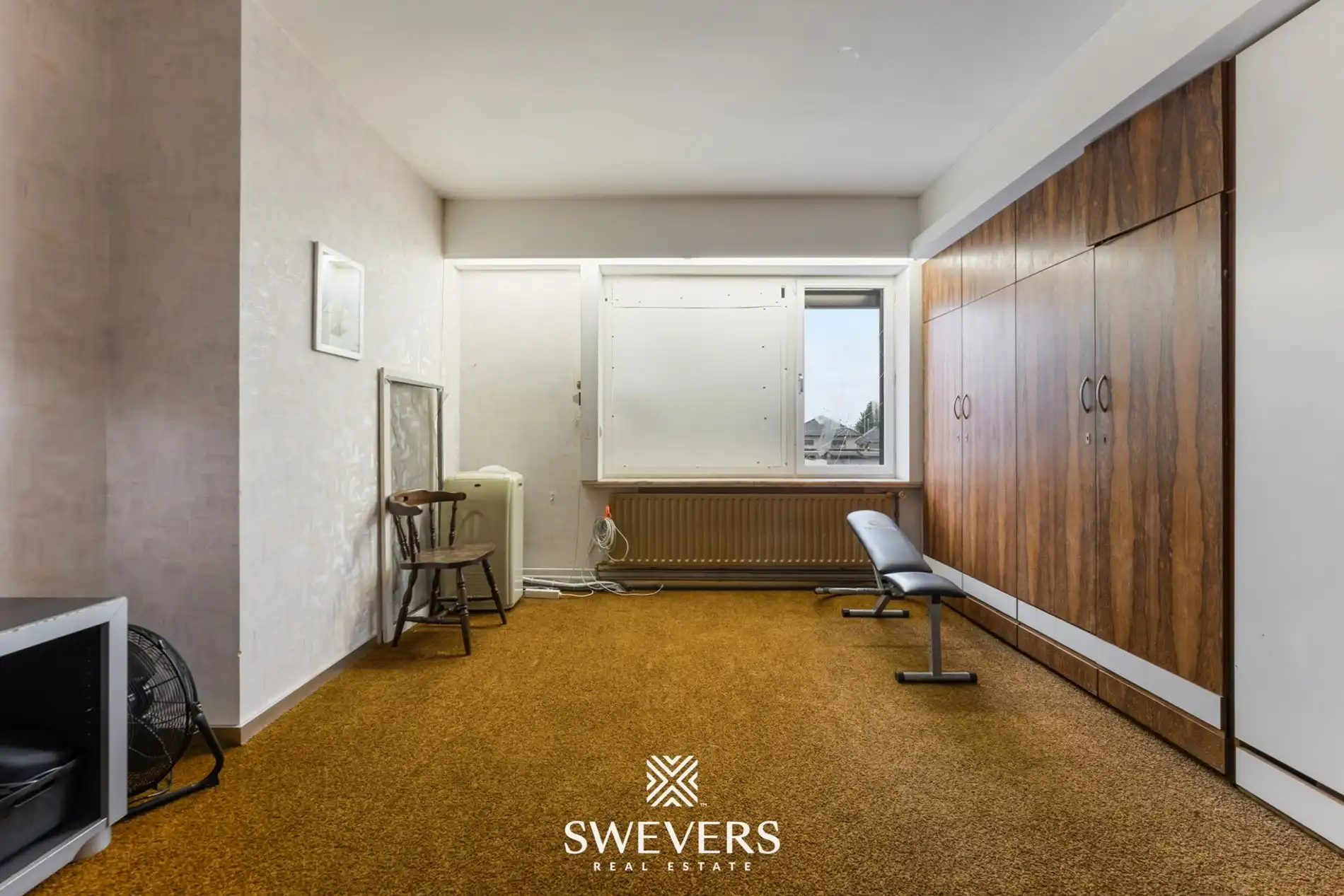 Opbrengsteigendom met handelspand, ruim appartement en uitbreidingspotentieel in hartje Heusden-Zolder foto 23