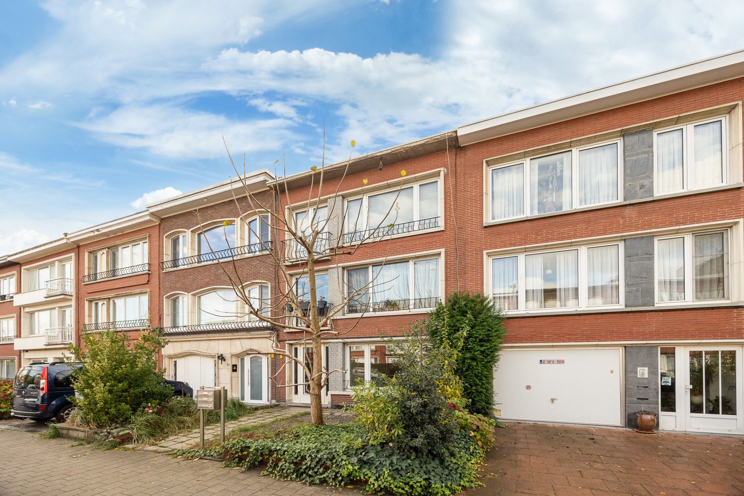 Modern gelijlvloersapp met charmante ZW-tuin foto 19