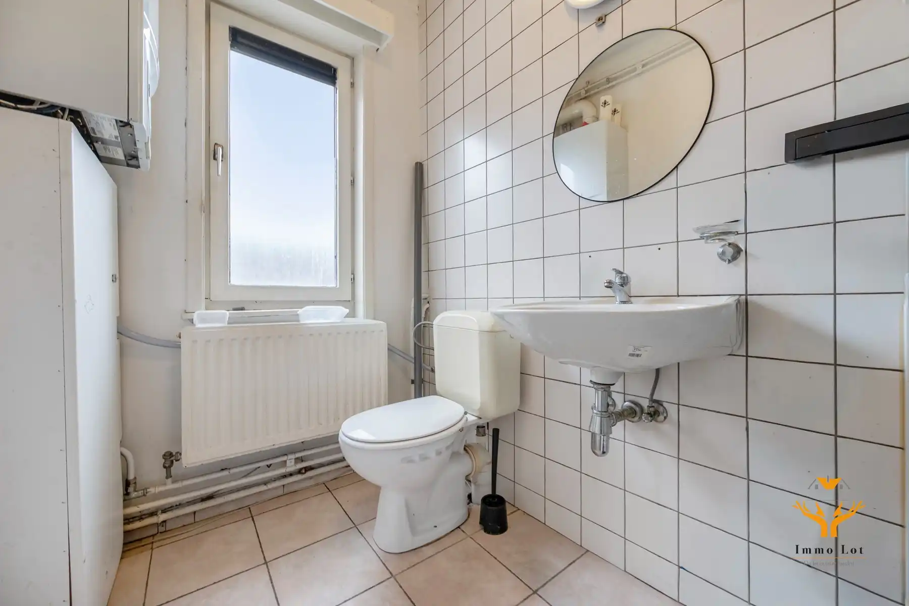 Woning met toonzaal, magazijn en garages te Hamme foto 14