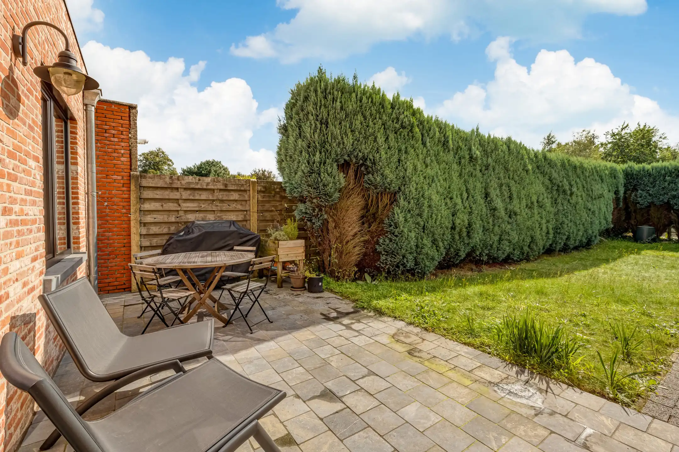 Luxueus gelijkvloers appartement met tuin en garage te huur in het centrum van Westmalle! foto 11