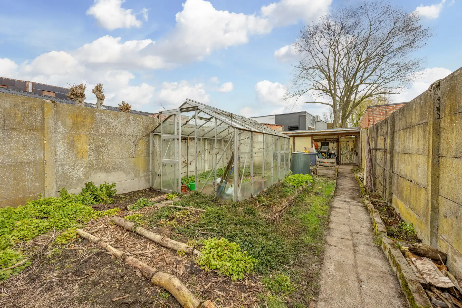 Stadswoning op een perceel van 230 m² met toegang achteraan de tuin. foto 16