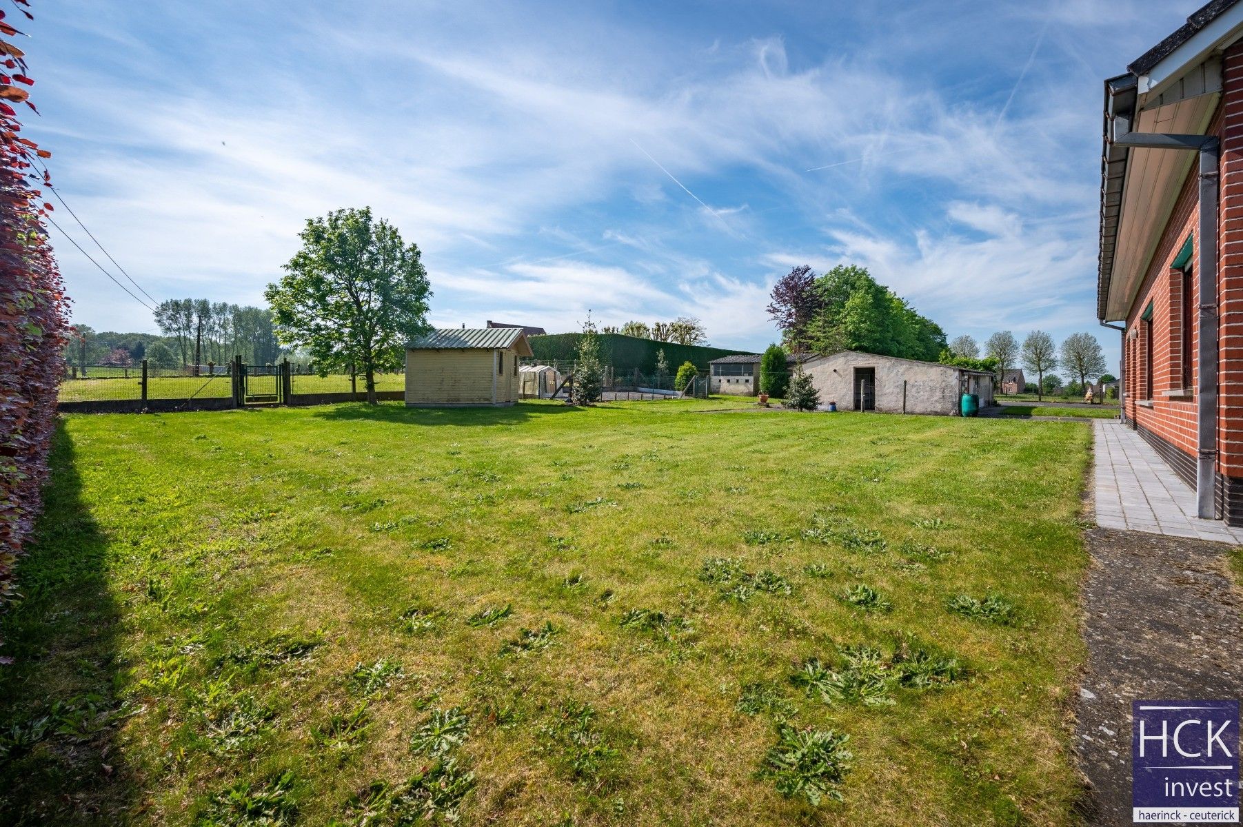 KRUISHOUTEM - Alleenstaande woning met bijgebouwen op royaal perceel 3074m² foto 7