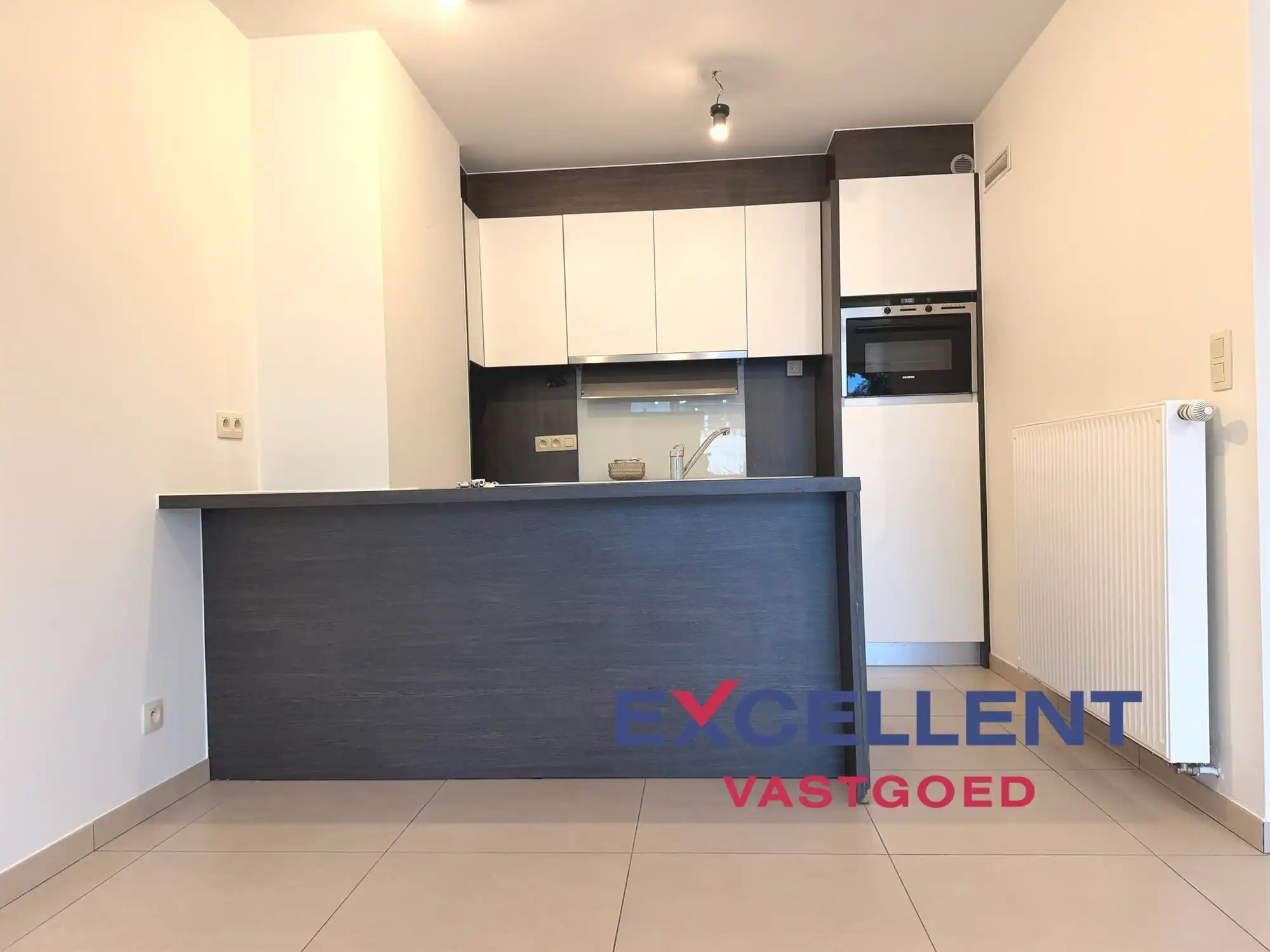 Instapklaar gelijkvloers appartement centrum Deinze foto 3