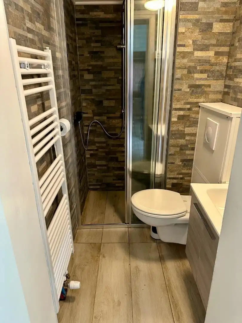 Te huur in Merchtem: compact 1-slpk-appartement met terras foto 6