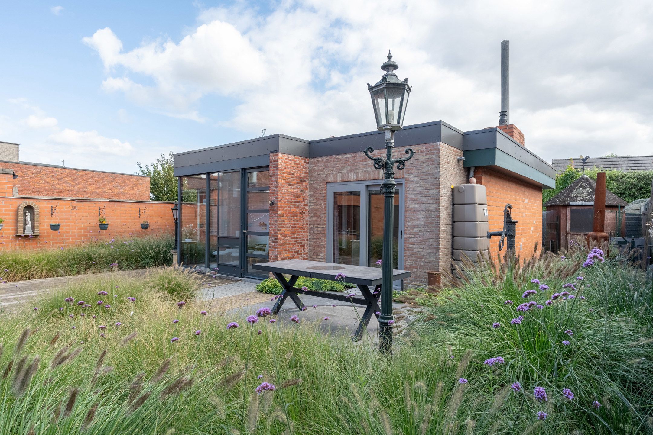 Te renoveren woning met tuin nabij centrum Vosselaar. foto 3