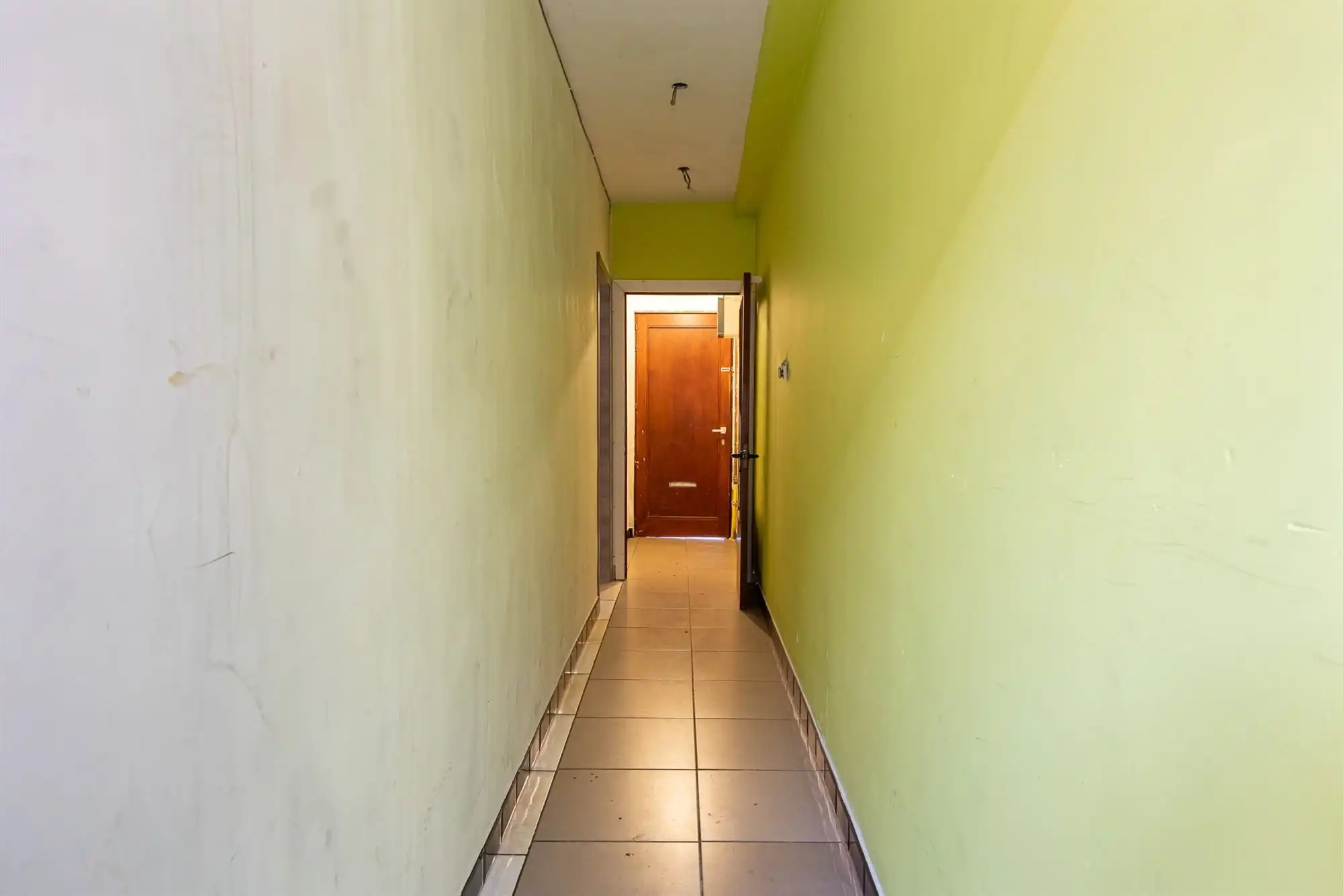 Opnieuw te koop: Te renoveren arbeidersw. met 3 slpk. en tuin foto 6