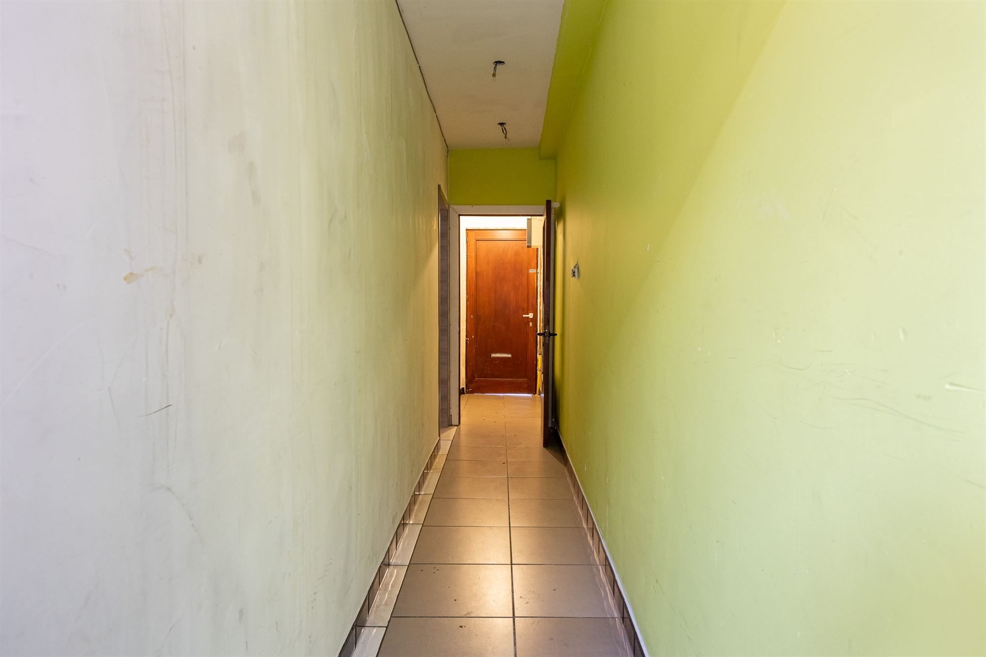 Te renoveren arbeiderswoning met 3 slpk. en tuin foto 6