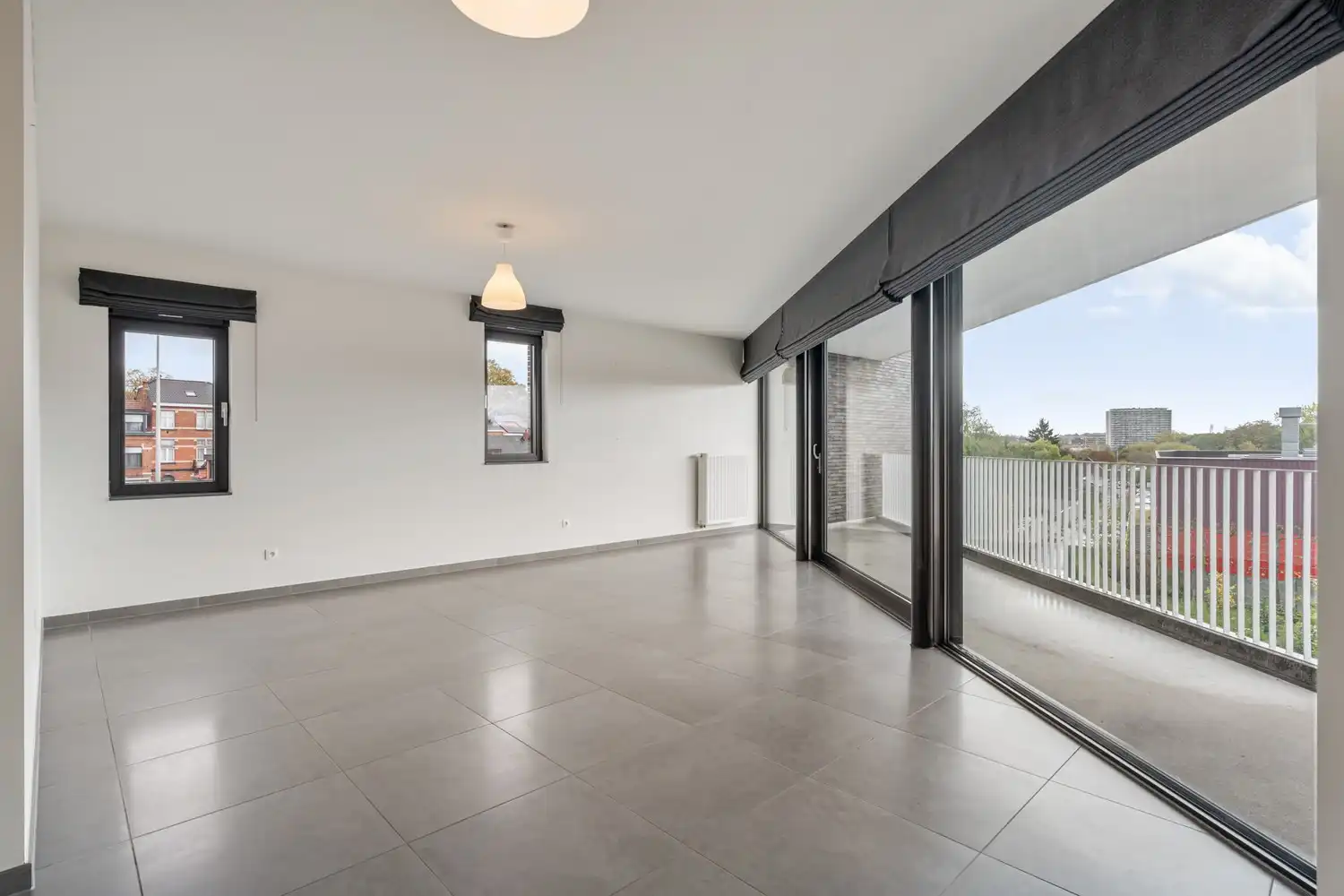 Modern en energiezuinig(A-label) dakappartement met 2 slaapkamers, 2 badkamers, een groot terras en een autostaanplaats nabij het UZ Gasthuisberg te Leuven! foto 7