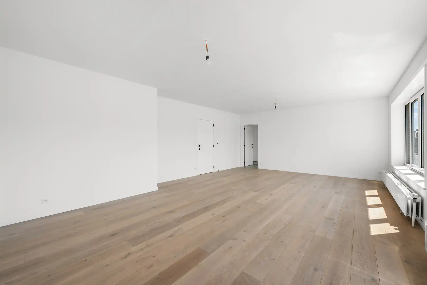 Gerenoveerd 2 slaapkamerappartement met garage foto 2