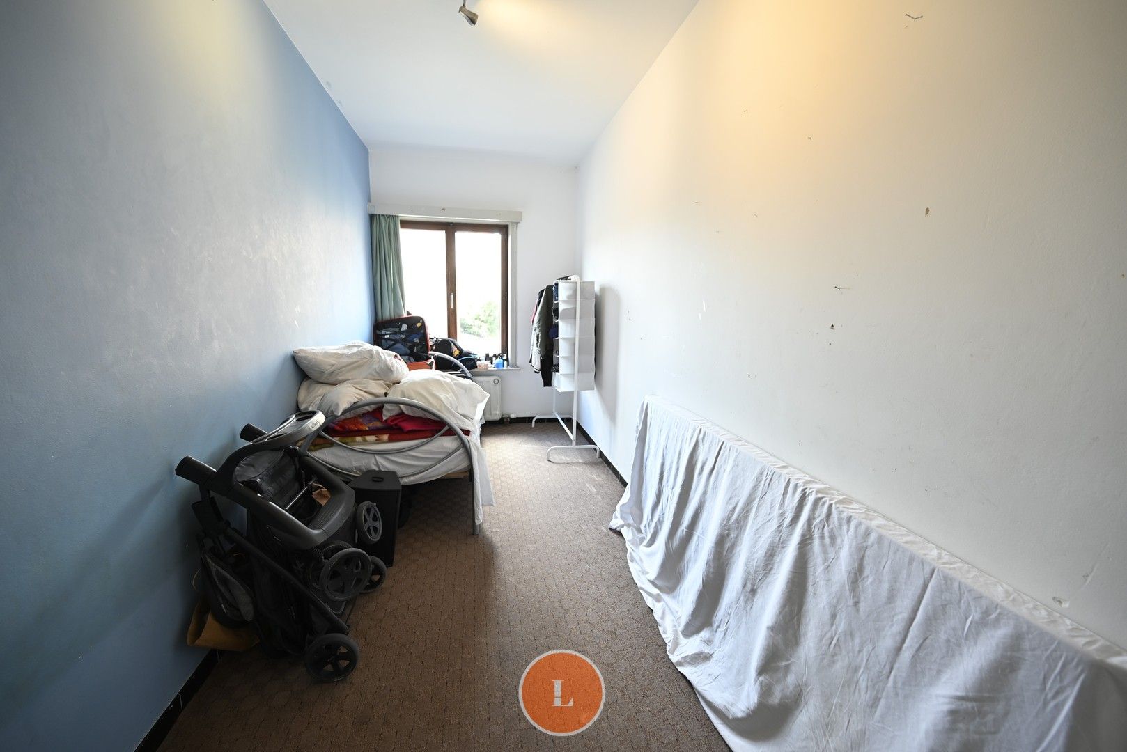 Opbrengst appartement met 2 slaapkamers en garage te koop in Roeselare! foto 10