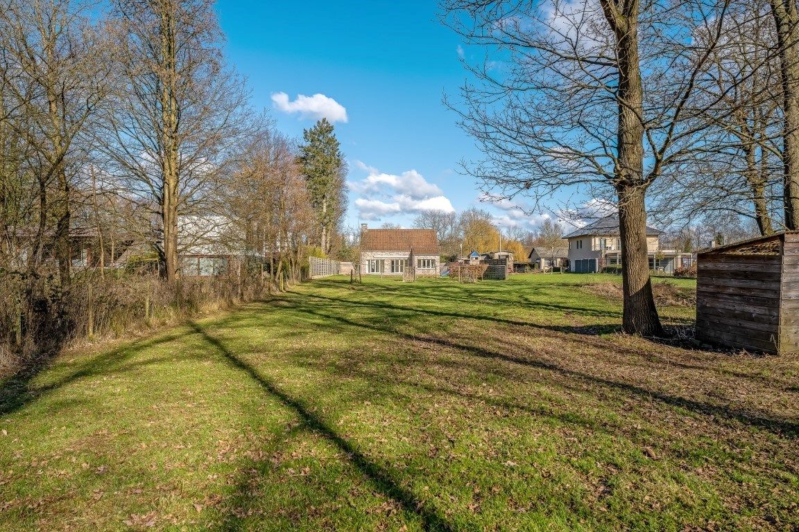 Ruim ingedeelde volledig onderkelderde woning met oa 4 slpks op 23are foto 29