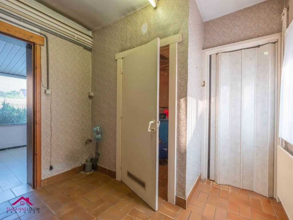 Te renoveren, vrijstaande woning op ruim perceel foto 26