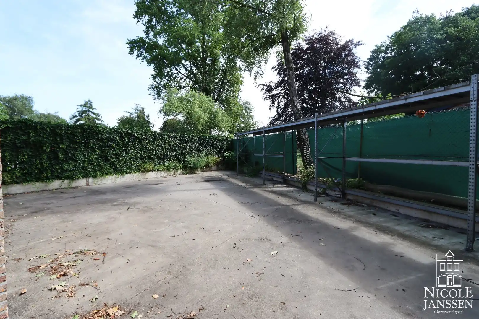 Grote loods en handelspand met bovengelegen woonst net buiten het centrum van Maaseik foto 6