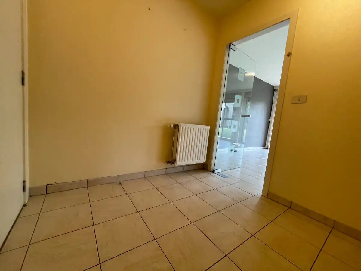 Gelijkvloers 1-slpk-APP + garage foto 11