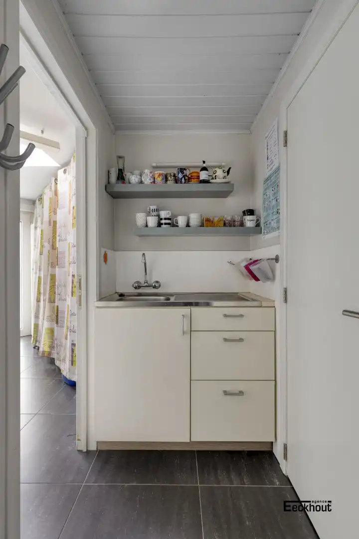 Instapklare woning met handelsruimte en met zonnige tuin! foto 25