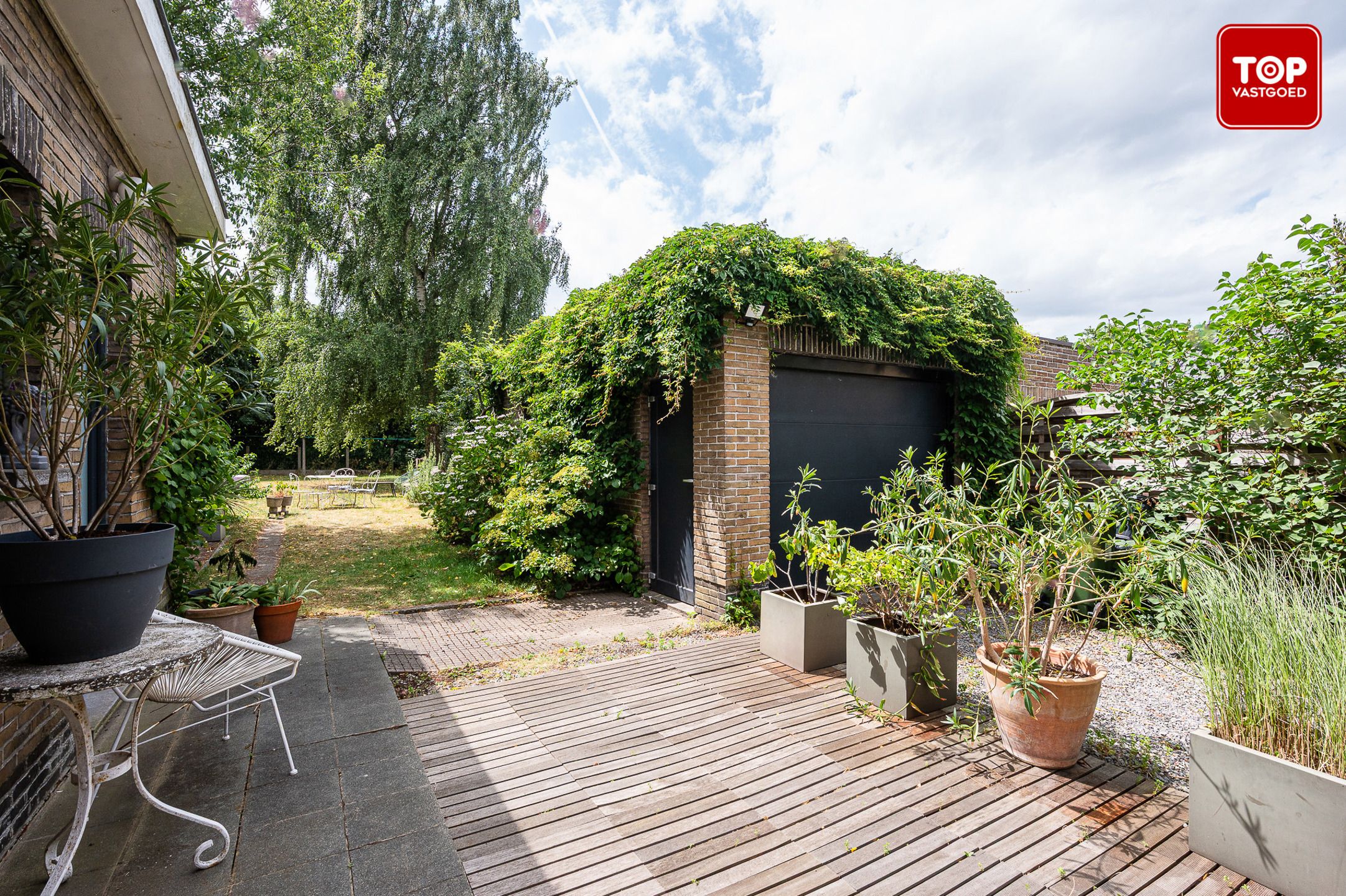 Gerenoveerde en lichtrijke gezinswoning met prachtige tuin foto 22