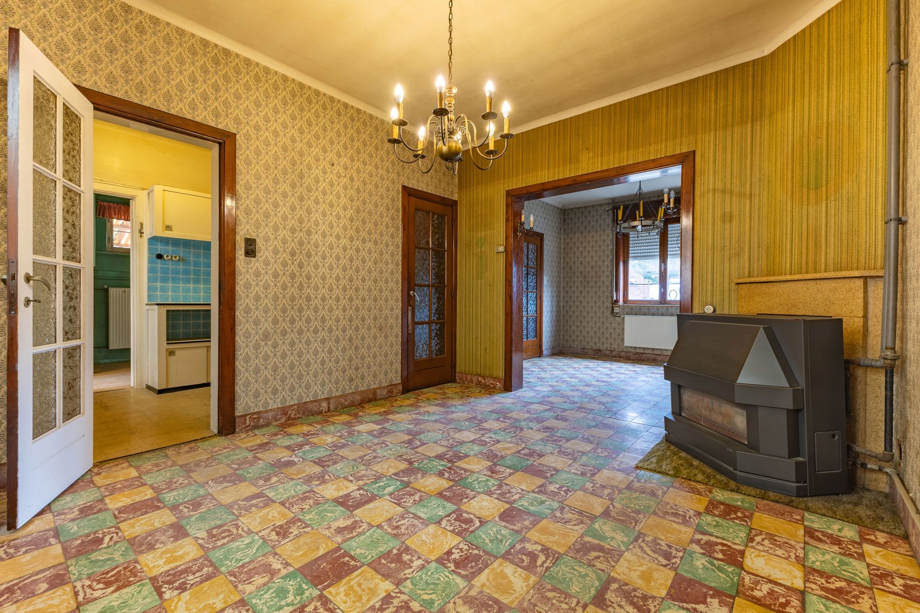 Gunstig gelegen te renoveren driegevelwoning foto 5