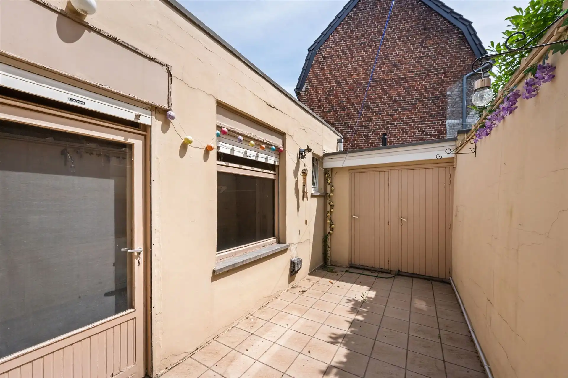 Te renoveren woning met 3 SLK, stadstuin en veel potentieel foto 8