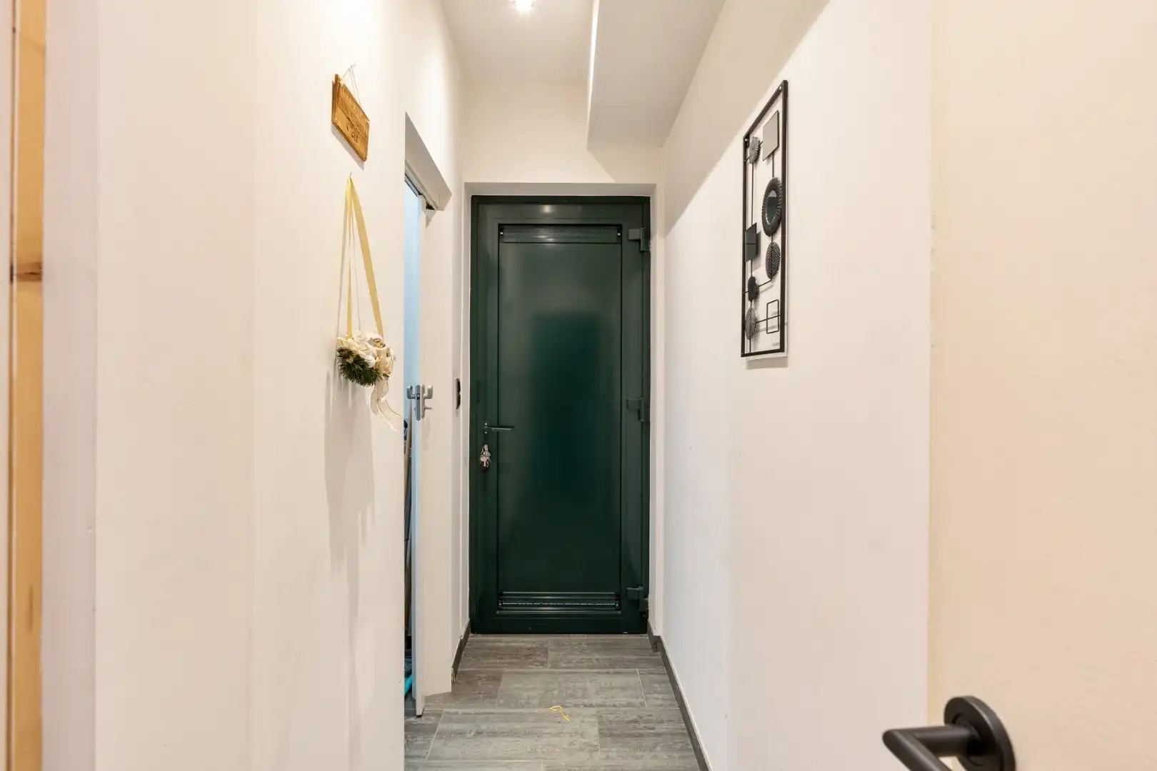 Gelijkvloersappartement (96m²) met 1 a 2 slaapkamers met ruim terras en standplaats - met achterliggende polyvalente ruimte (148 m²) foto 6