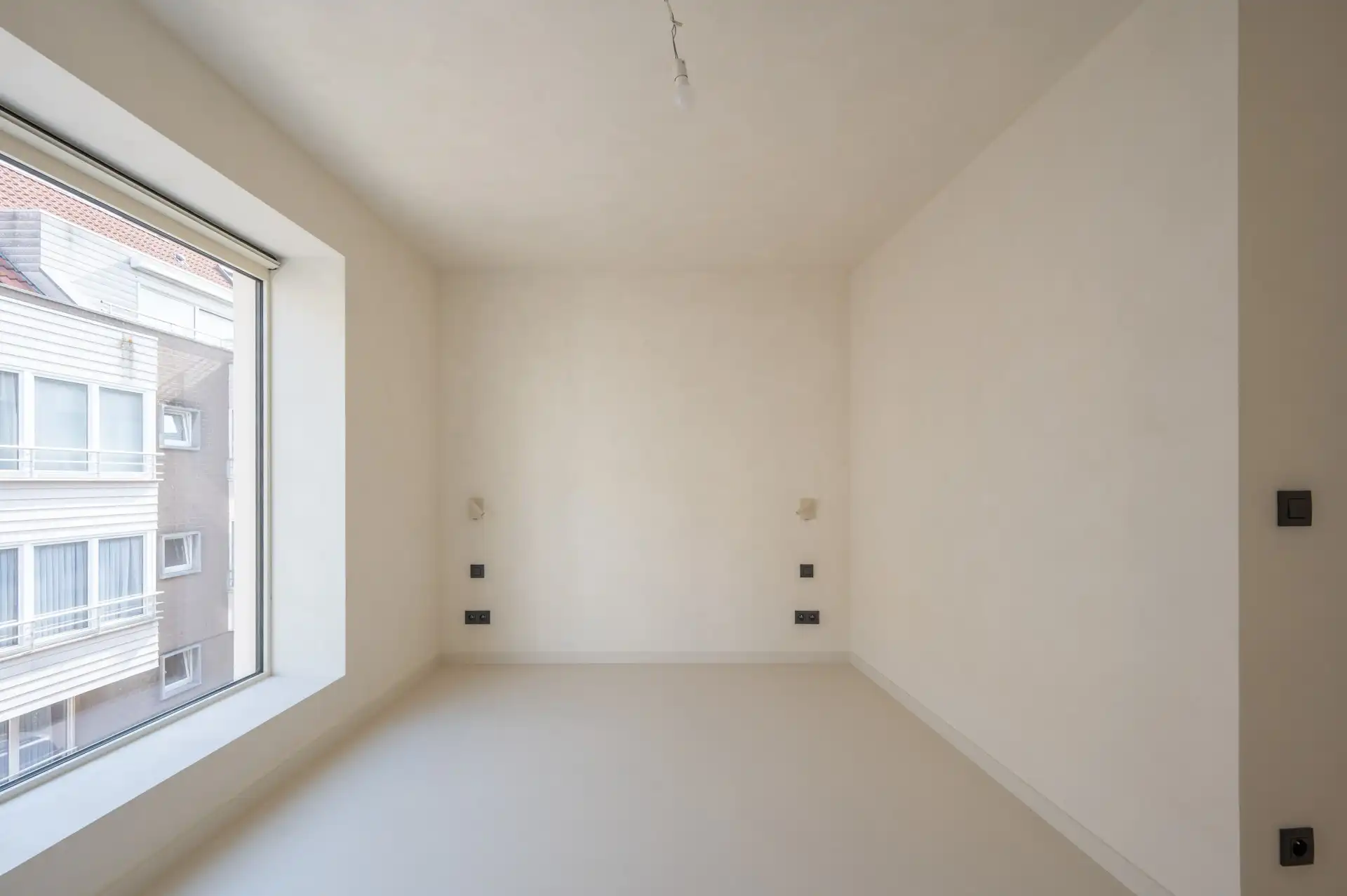 Volledig vernieuwde opbrengsteigendom met drie appartementen en verhuurd handelsgelijkvloers foto 17