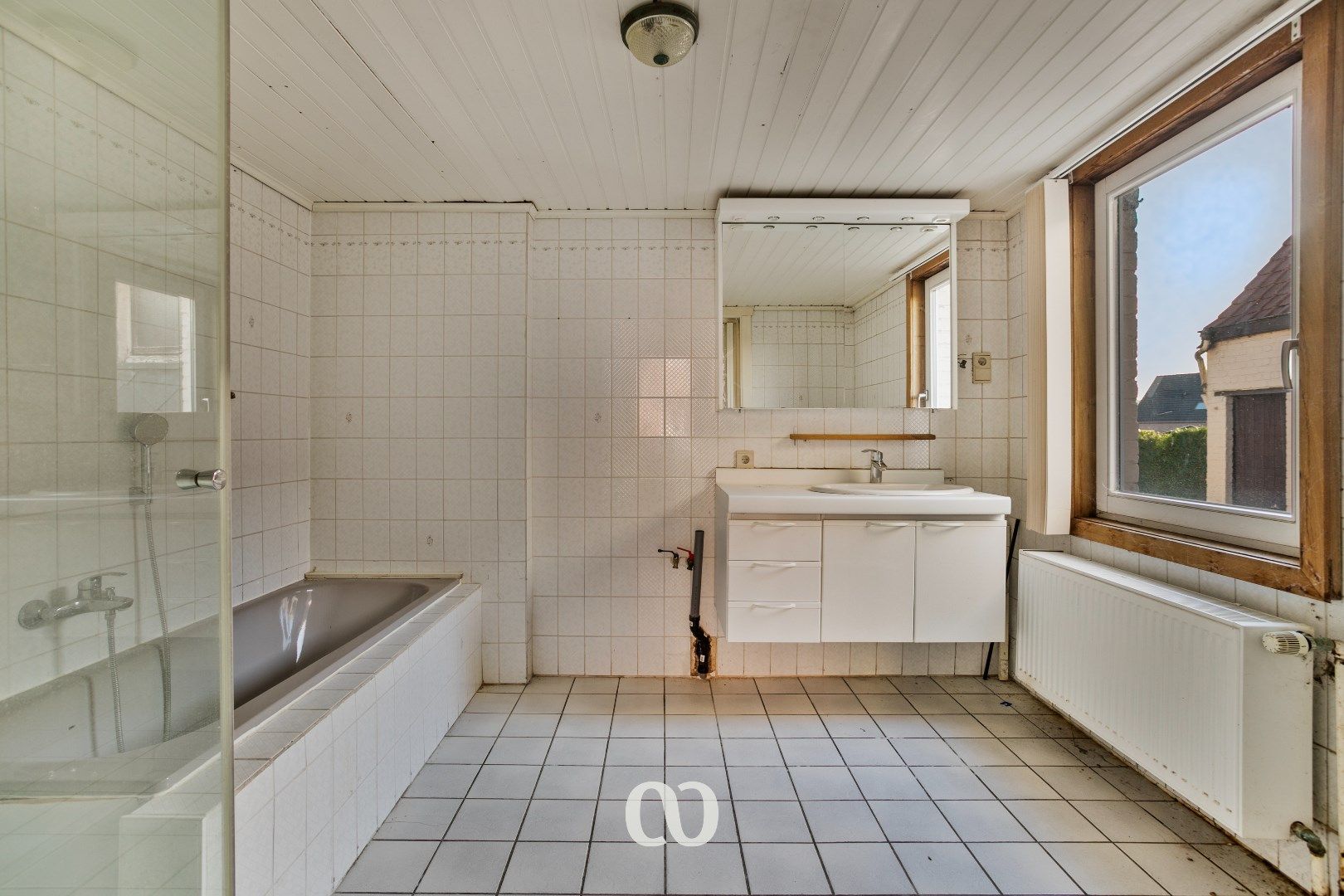 Te renoveren woning met bouwgrond foto 10