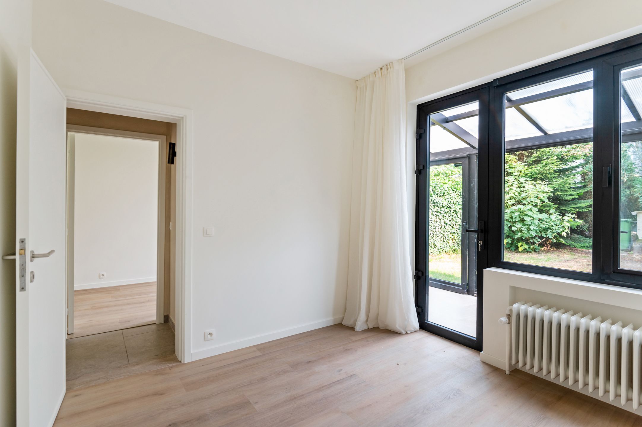 Prachtig gerenoveerde woning (3 slk.) op de Oosterveldwijk foto 11