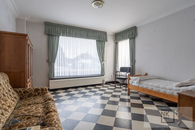 Huis met 3 slaapkamers op centrale ligging te Kasterlee op een perceel van 1055 m²! foto 9