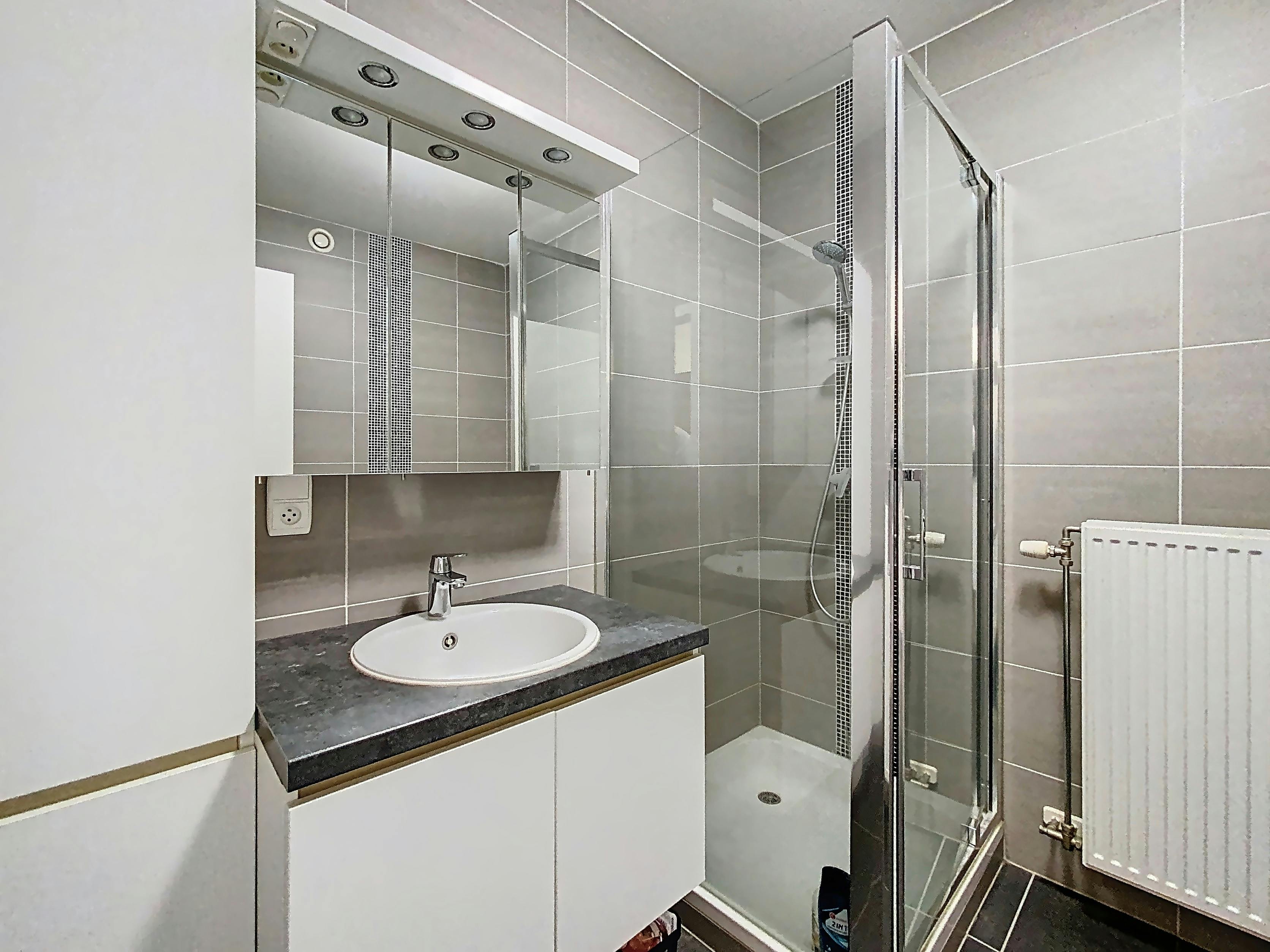 Gezellig gelijkvloers appartement met 2 slaapkamers en tuin foto 7