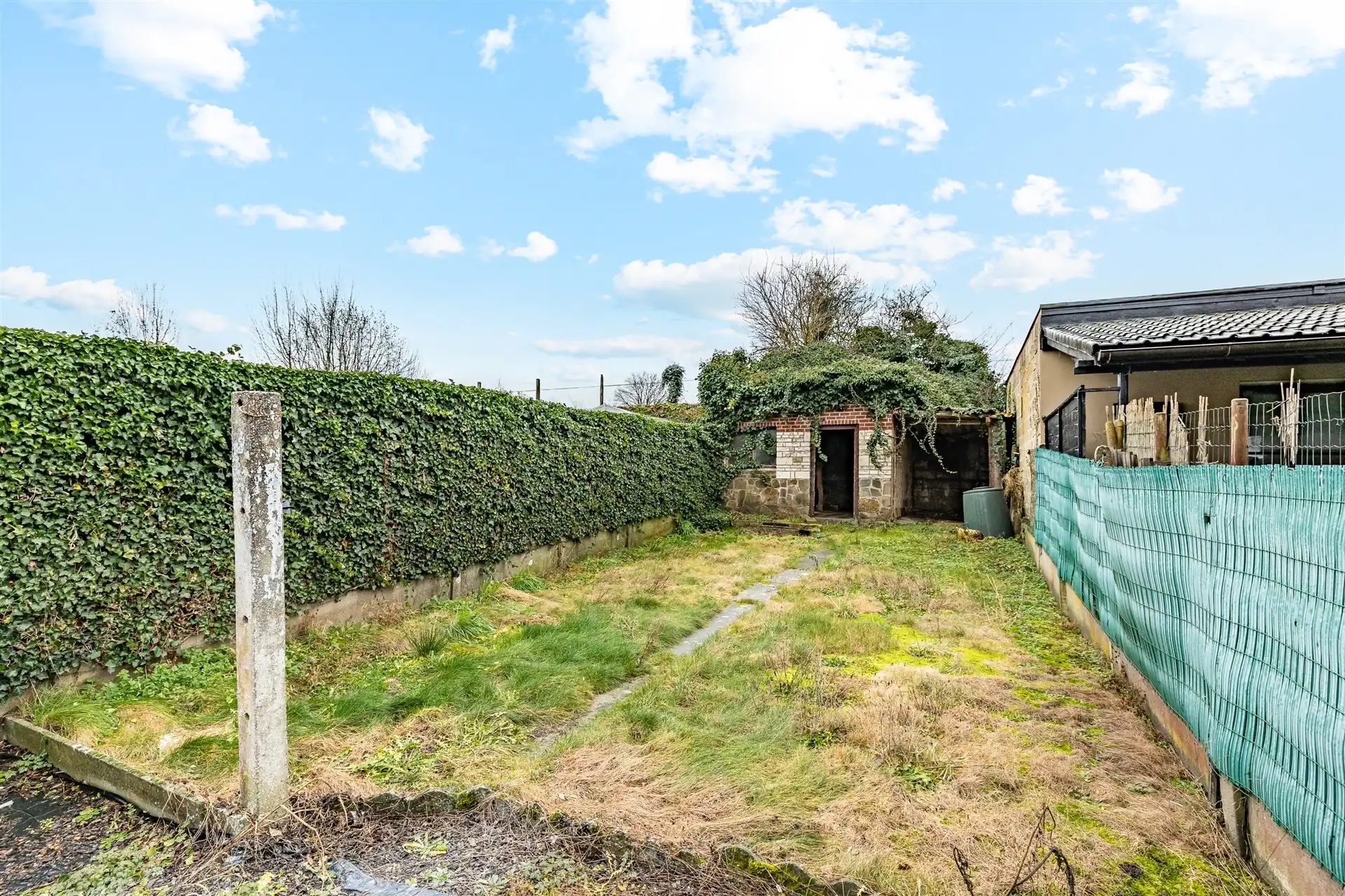 Charmante gezinswoning met tuin en zijdoorgang in rustige straat te Denderleeuw foto 19