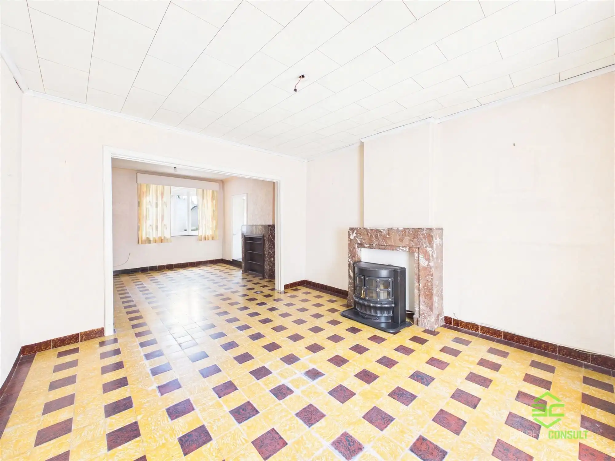 Centraal gelegen te renoveren woning met 3/5slpk! foto 6