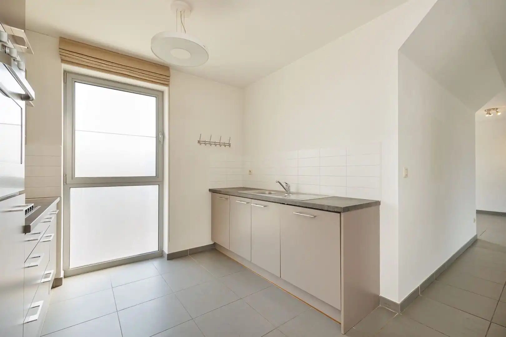 Lichtrijk dakappartement met 2 slaapkamers en ruim terras foto 12