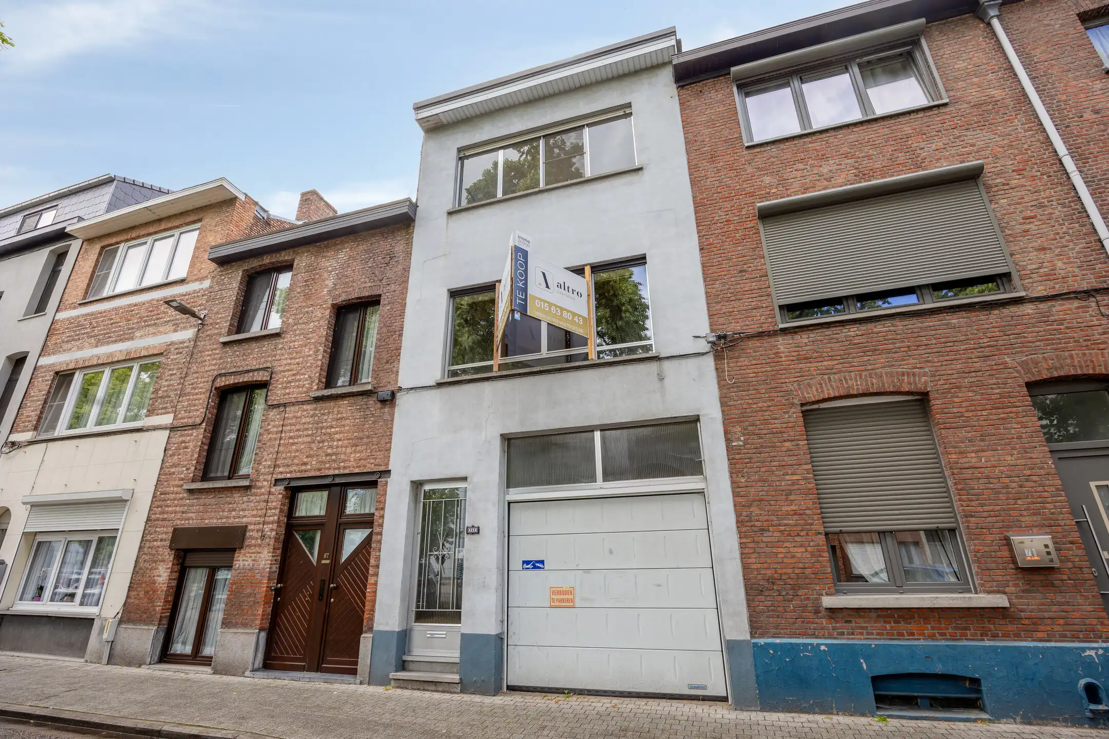 Te renoveren woning met grote garage foto 32