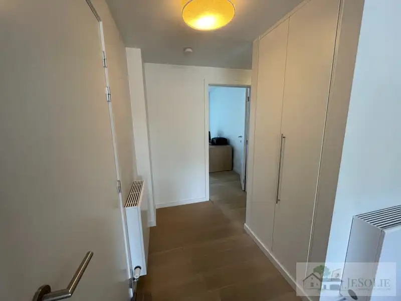 Tiptop verzorgd 2 slpk appartement met groot terras foto 9