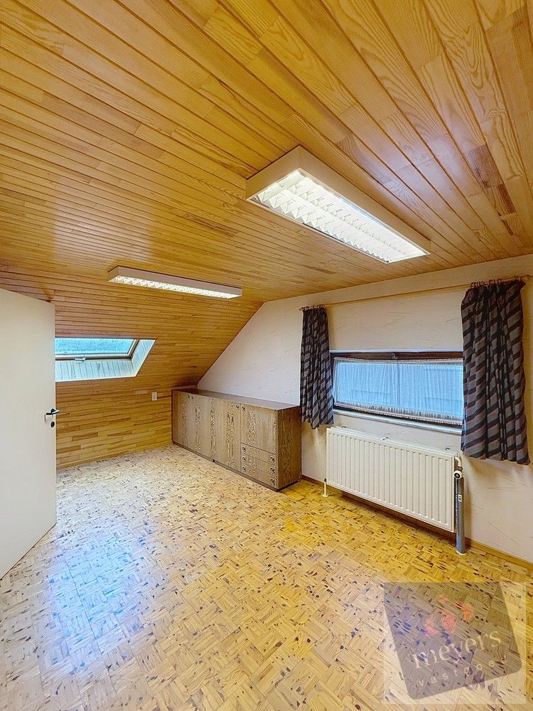 Ruime halfopen gezinswoning met tuin en garage in Hasselt foto 18