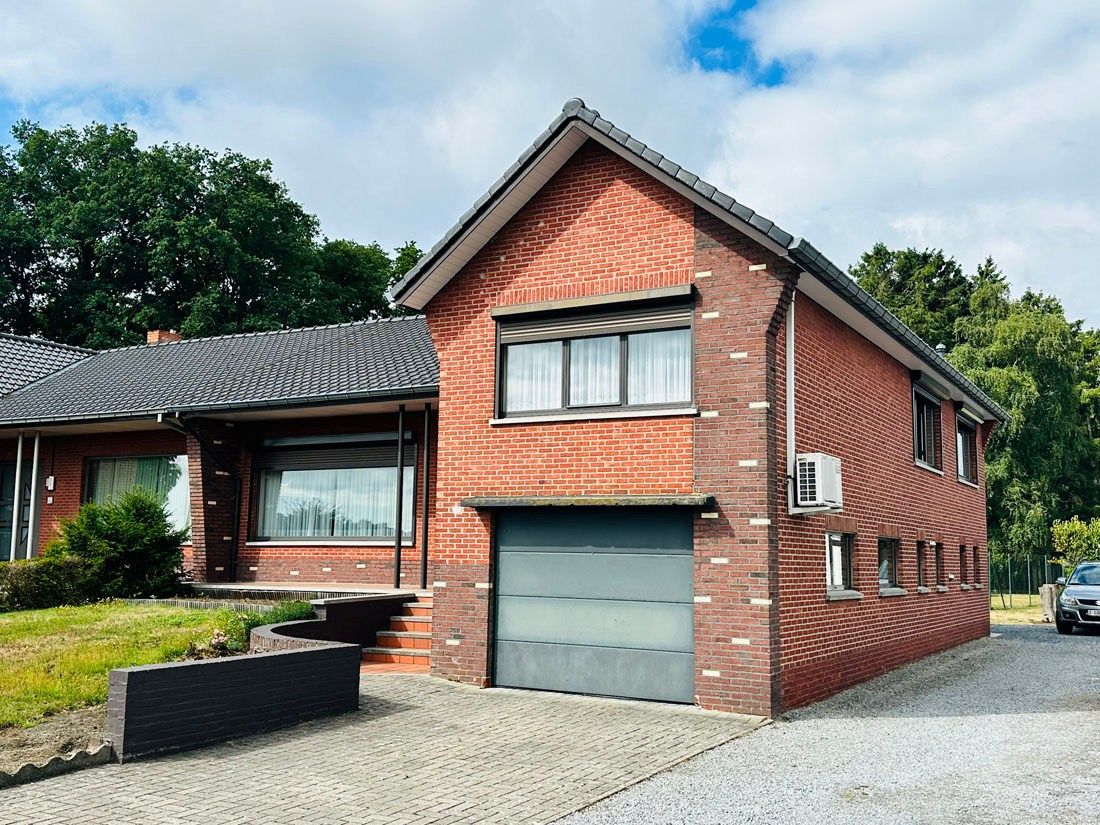 Leuke SPLITLEVEL op een mooi ruim perceel foto 2
