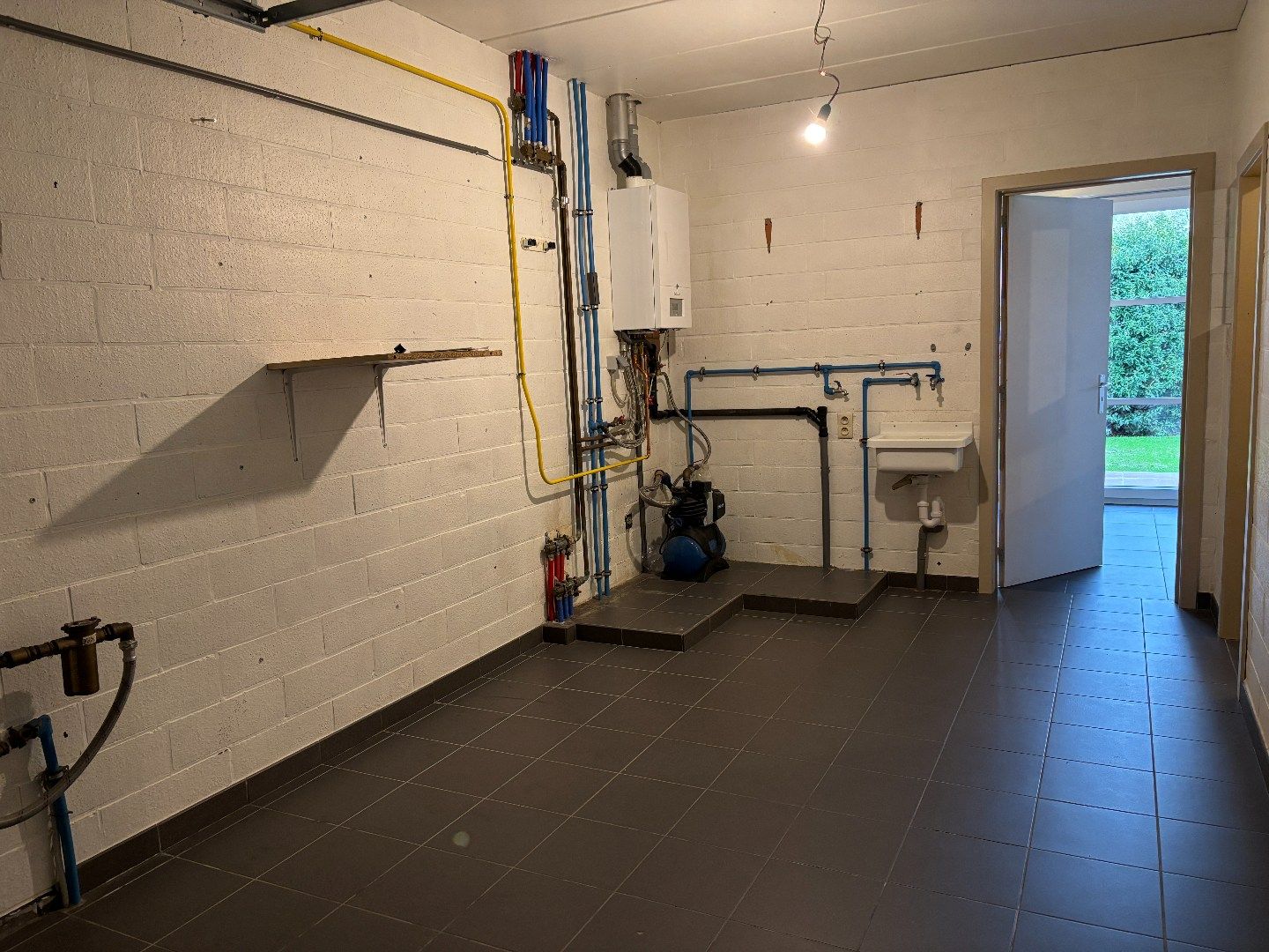 Leuke woning met 3 slaapkamers, garage en tuin! foto 12