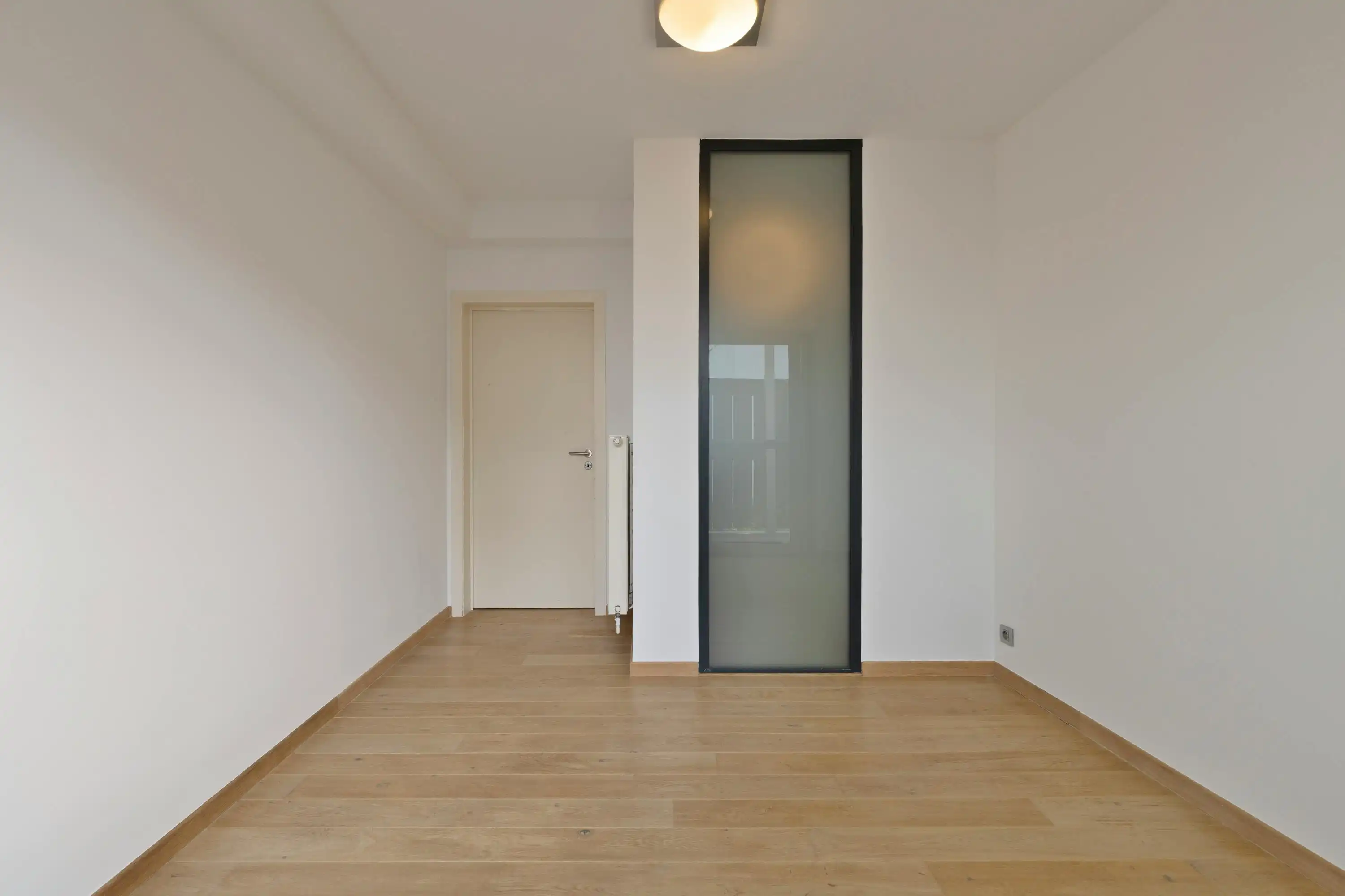 Ruim appartement met groot terras tegenover het Begijnhof foto 9