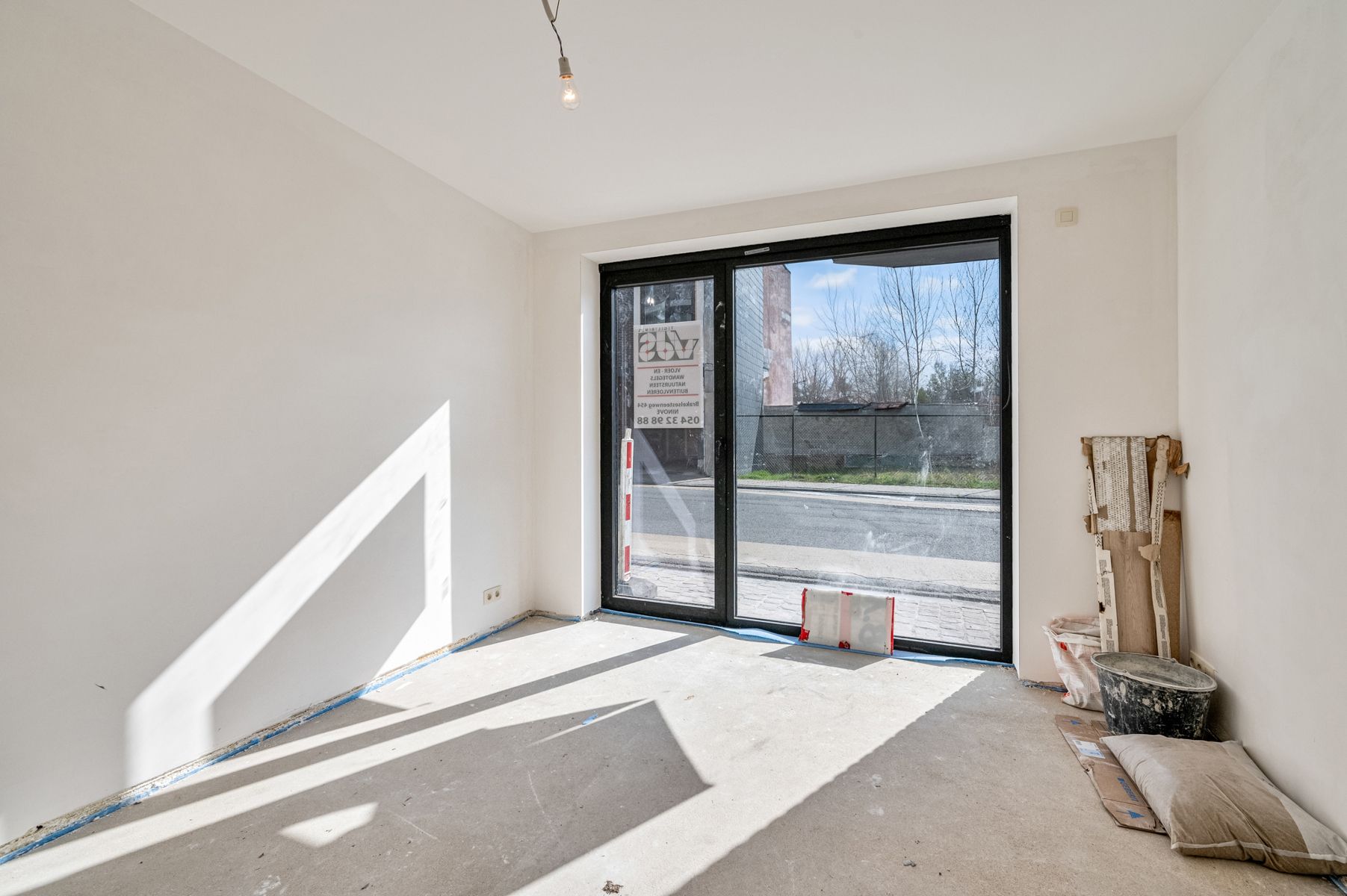 Gelijkvloers NB-appartement met terras en tuintje! foto 11