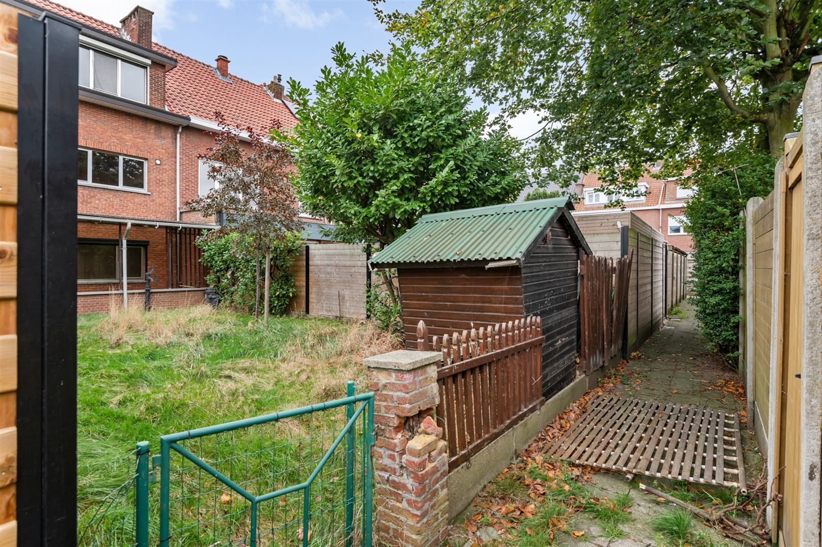 Te renoveren bel-étagewoning met zonnige tuin. foto 17