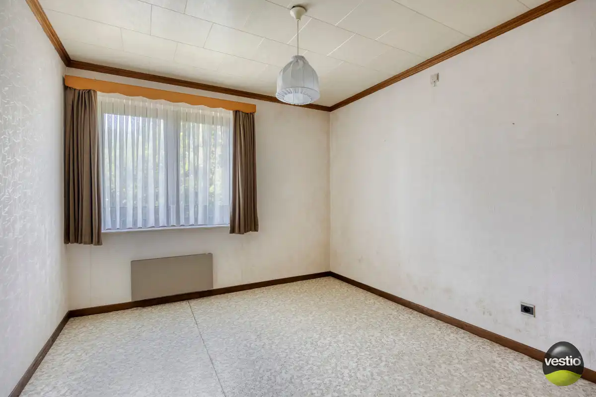 RUSTIG GELEGEN TIJDLOZE WONING MET 4 SLK EN RUIME TUIN. foto 23