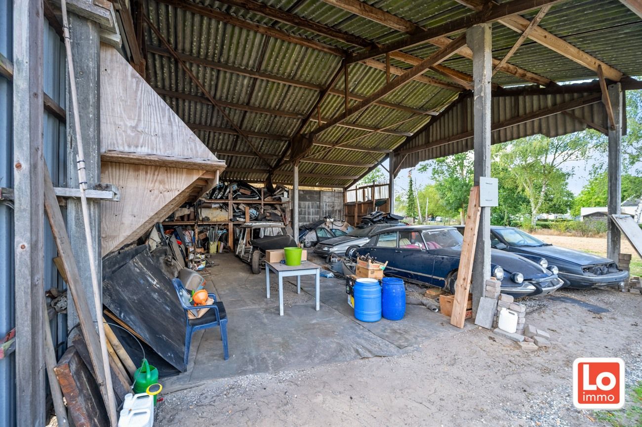 Statige open woning met ruim bijgebouw op groot perceel grond in het centrum van Kalken! foto 13