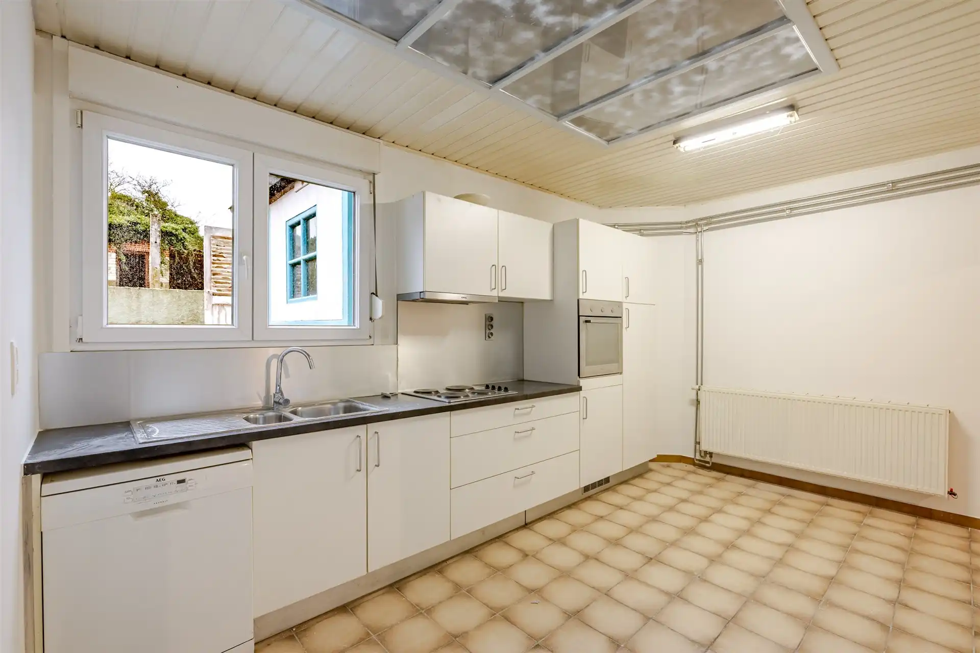 Charmante gezinswoning met tuin en zijdoorgang in rustige straat te Denderleeuw foto 9