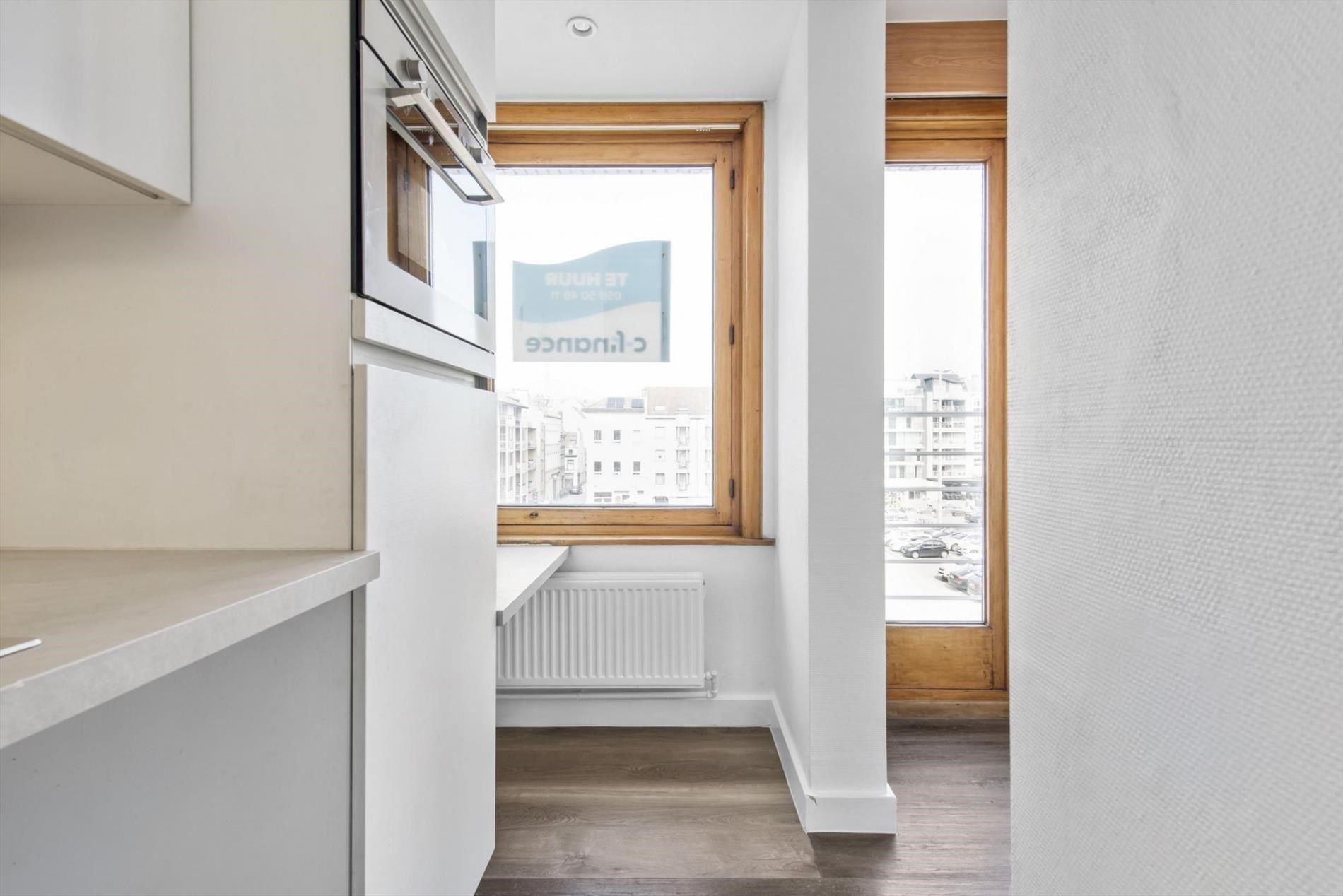 Ruim woonappartement in het stadscentrum met open zicht op het Mijnplein! foto 9