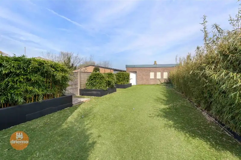 Ruime woning met handelspand foto 12