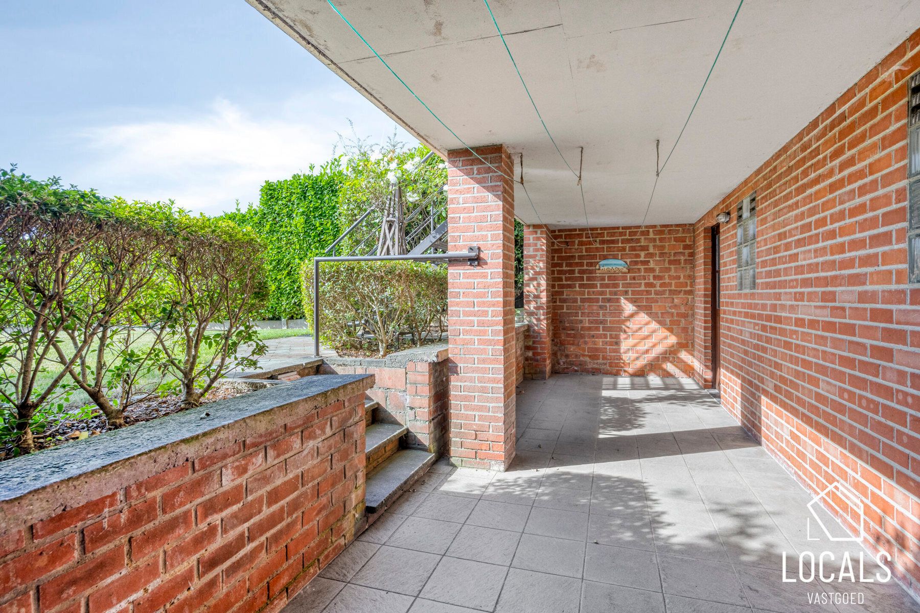 Gelijkvloers appartement met tuin foto 20