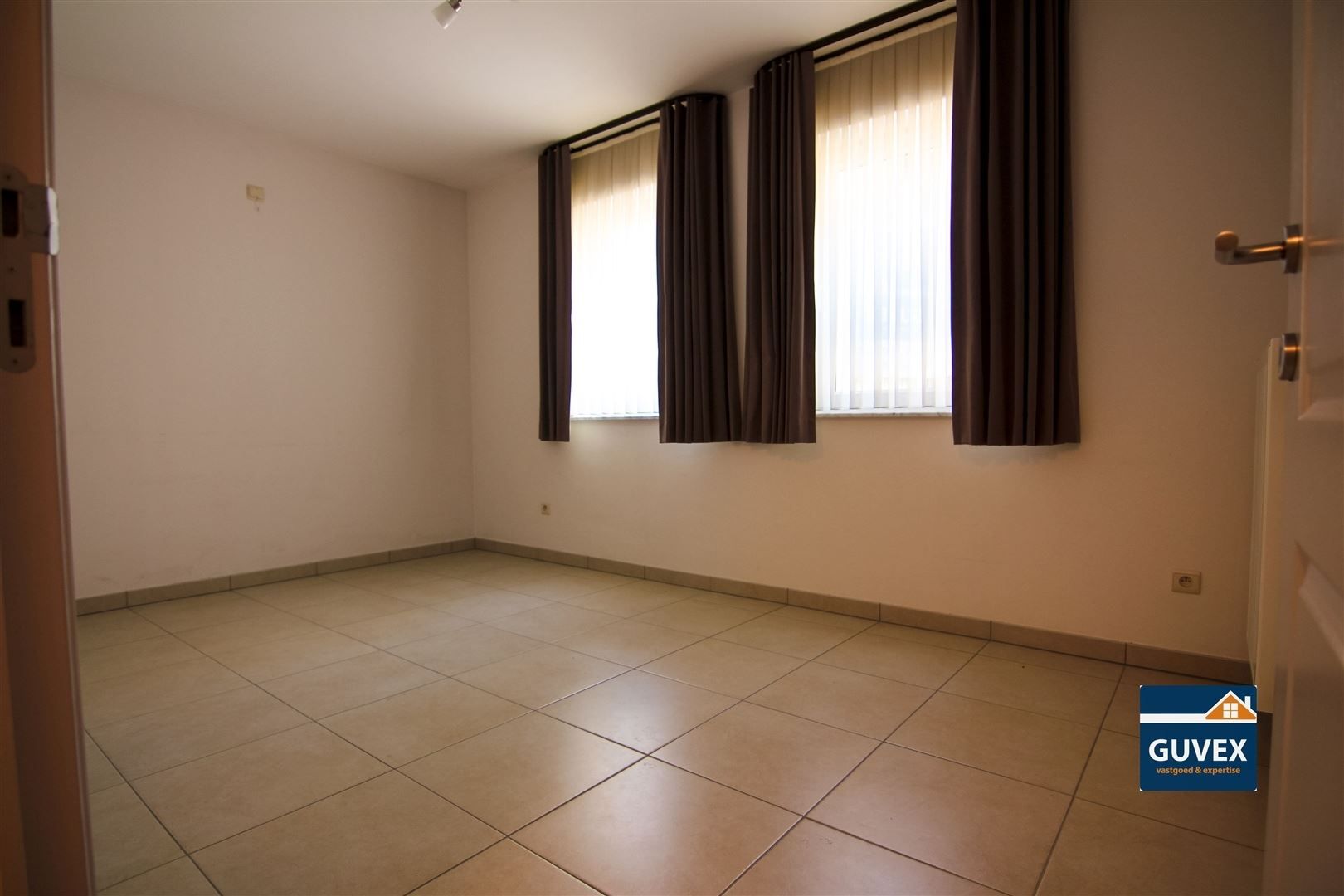 Verzorgd en ruim gelijkvloers appartement te Alken. foto 10